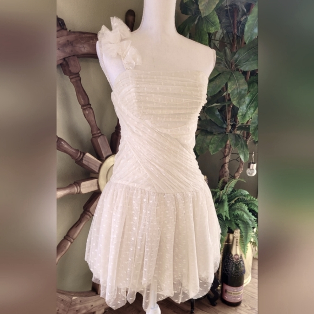 B. Darling Ivory Junior Event Dress.